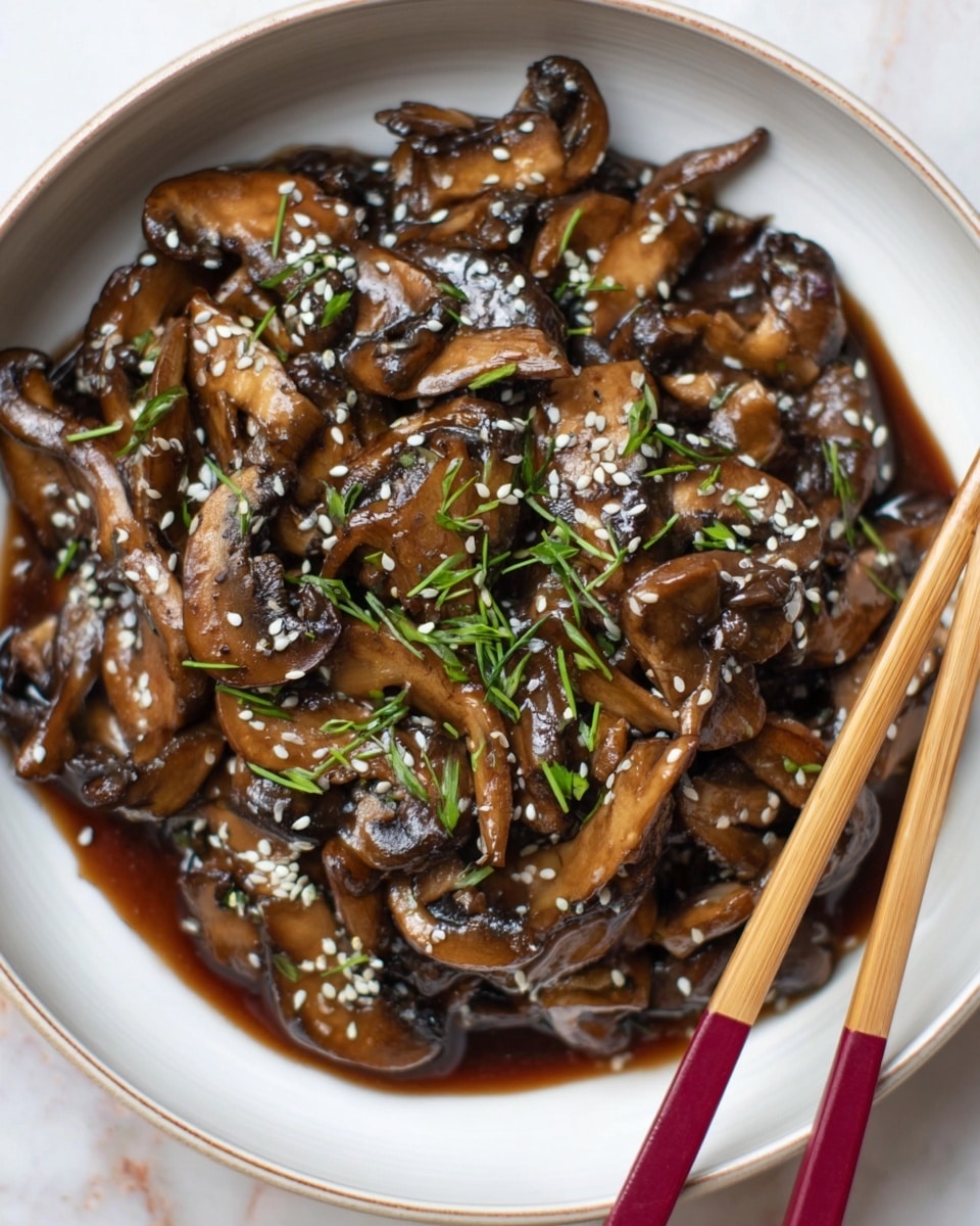 A white bowl filled with cooked shiitake mushrooms in a shiny dark brown sauce, the mushrooms are sliced and layered with some pieces upright and others laying flat, topped with scattered chia seeds and finely chopped green herbs. A pair of red and natural wood chopsticks rests on the edge of the bowl, and the bowl sits on a white marbled surface next to a cloth with a leaf pattern in yellow, green, and blue shades. photo taken with an iphone --ar 4:5 --v 7