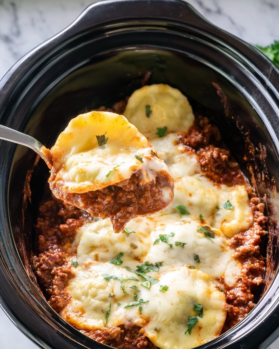 The image shows a black slow cooker filled with three layers of food. The bottom layer is a chunky red meat sauce with visible bits of ground beef and a tomato base. Above this is a layer of round ravioli pasta, with soft pale yellow edges and a smooth texture. The top layer is melted white cheese that covers the ravioli, looking gooey and creamy with a few slightly browned spots. Small green parsley leaves are sprinkled on top for color. A metal spoon is lifting one ravioli from the slow cooker, showing the layers and sauce on it. The scene is set on a white marbled surface. Photo taken with an iphone --ar 4:5 --v 7